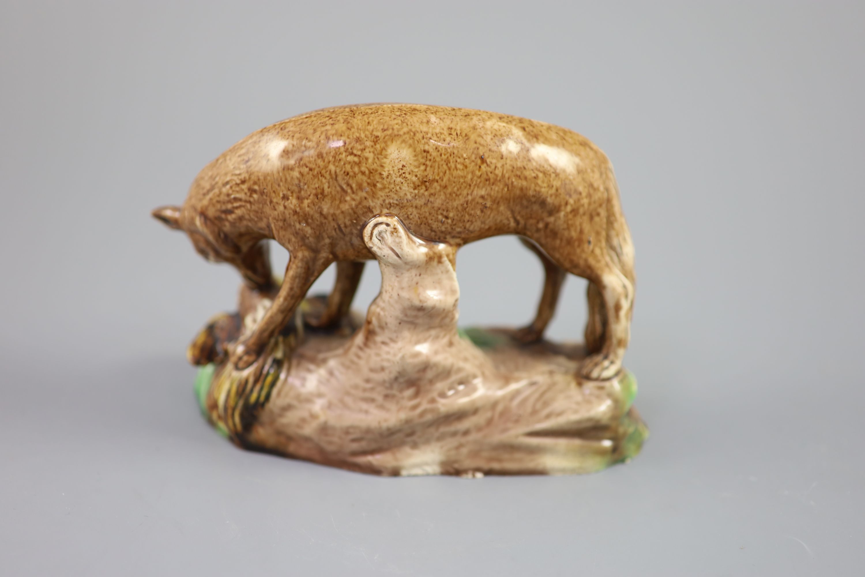 A Ralph Wood the Younger polychrome pottery figure of a fox with rooster, c.1780, 16.5cm long